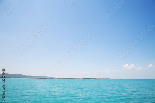 Landscape of the sea. Clear sky and water.