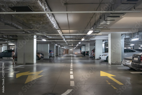 Underground garage or modern car parking with lots of vehicles