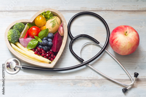 Healthy food in heart diet concept with stethoscope
