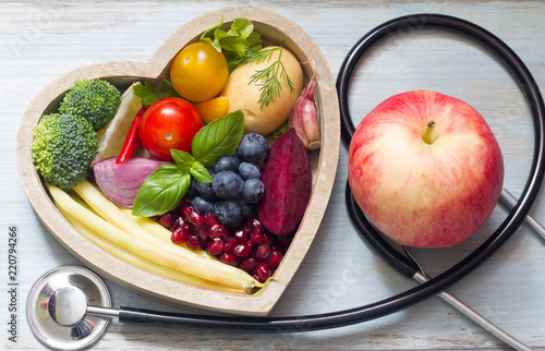 Healthy food in heart diet concept with stethoscope
