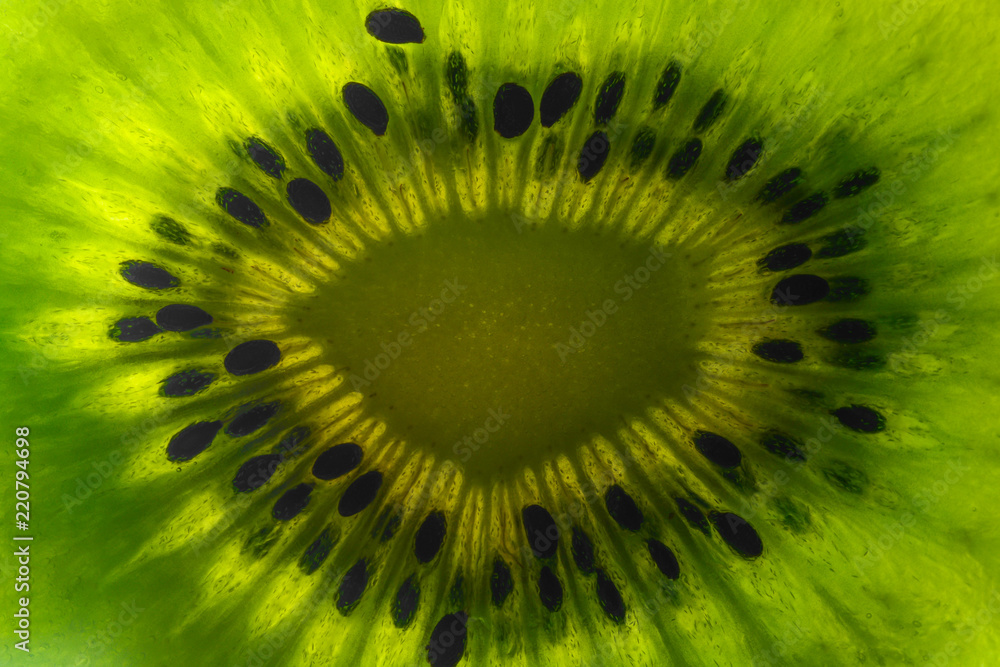 Kiwi fruit texture background with selective focus and crop fragment Kiwi fruit texture background with selective focus and crop fragment