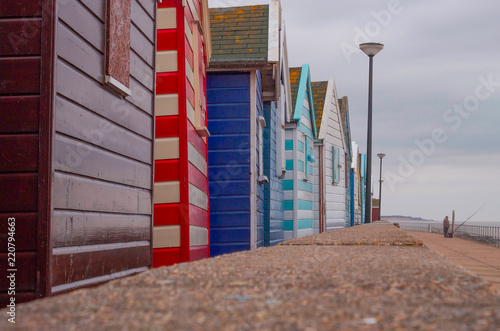 Beach Huts with Fisherman
