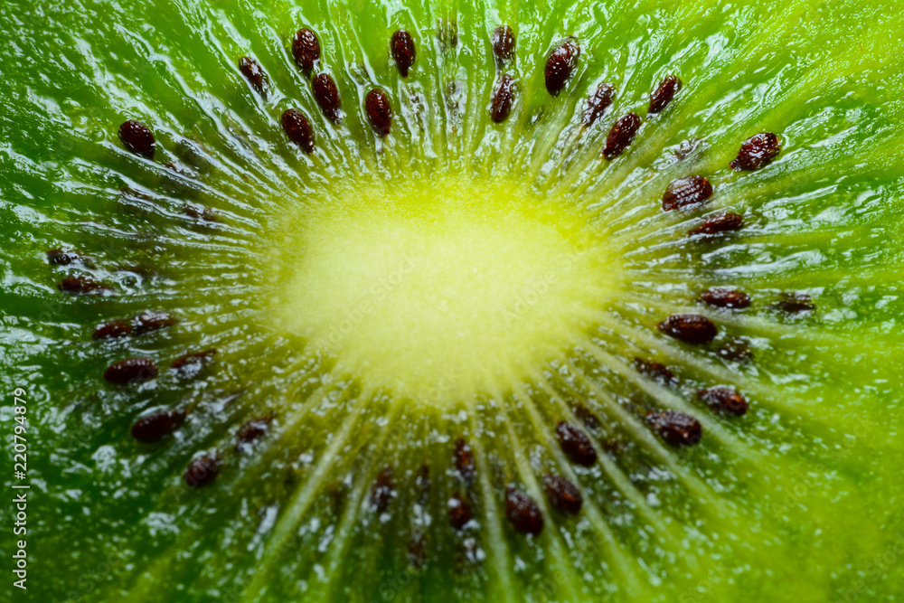 Kiwi fruit texture background with selective focus and crop fragment