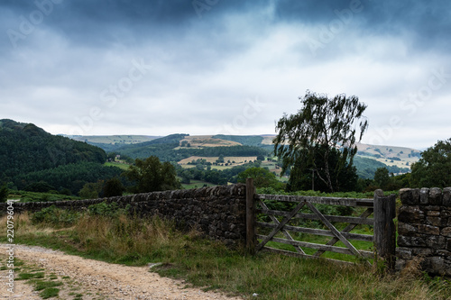 Dark skies over the hills and country path