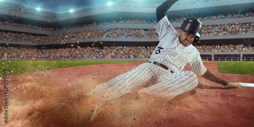 Obraz na płótnie Baseball runner slide to the second base on professional baseball stadium