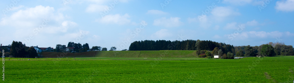 Bright green meadows and blue sky Bright green meadows and blue sky