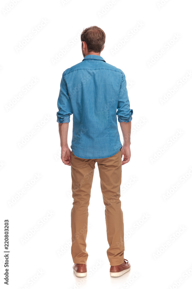 back view of a casual man standing Stock Photo | Adobe Stock
