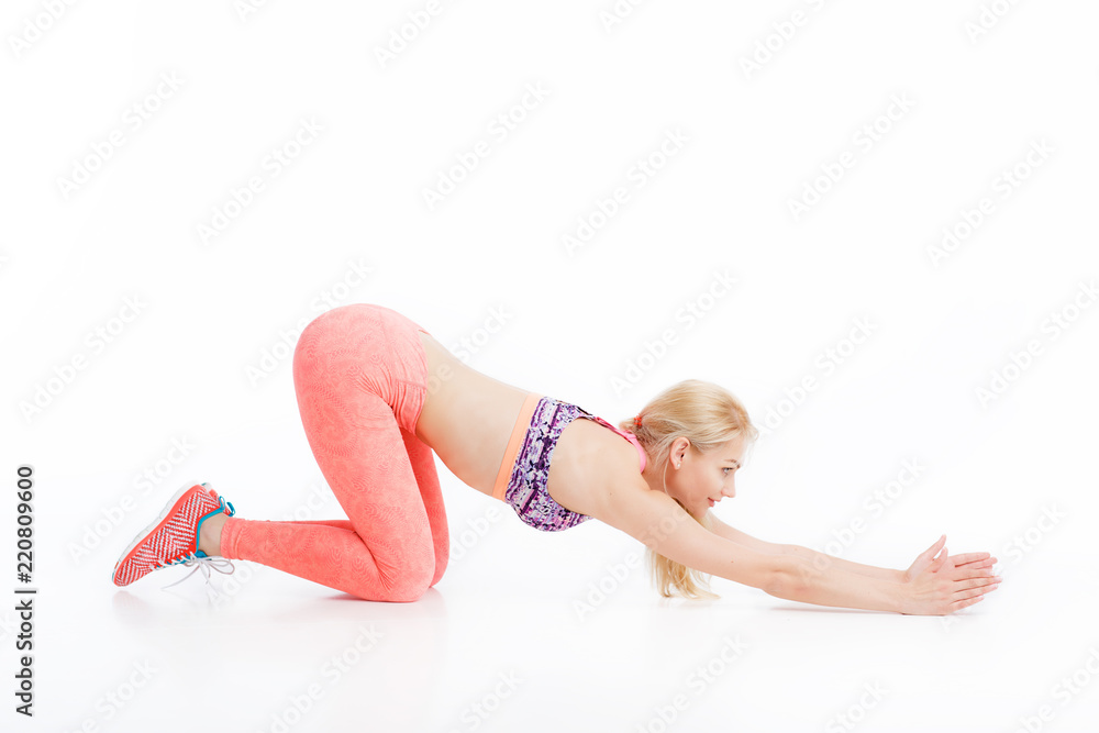 Fit young pretty woman exercise on the floor. Health conception. Yoga exercise Fit young pretty woman exercise on the floor. Health conception. Yoga exercise