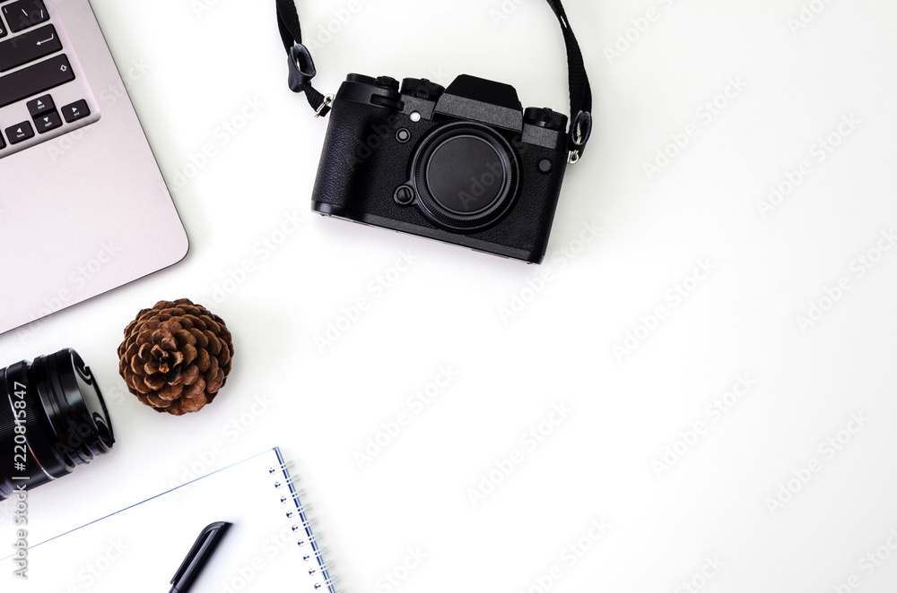 Camera Notepad desk workspace with laptop keyboard, hipster camera, lens, notepad for ...