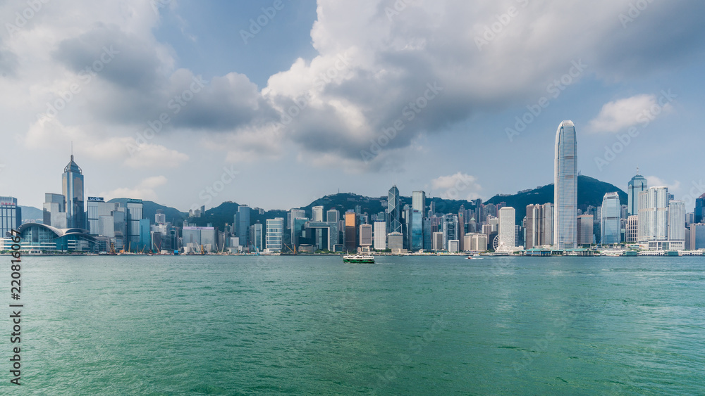 Naklejka premium Victoria Harbour in Hong kong,Tsim Sha Tsui, Hong Kong,Landmark city view in Hongkong.
