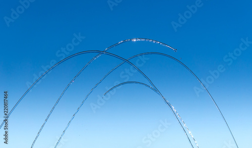 Streams and drops of water on a blue background