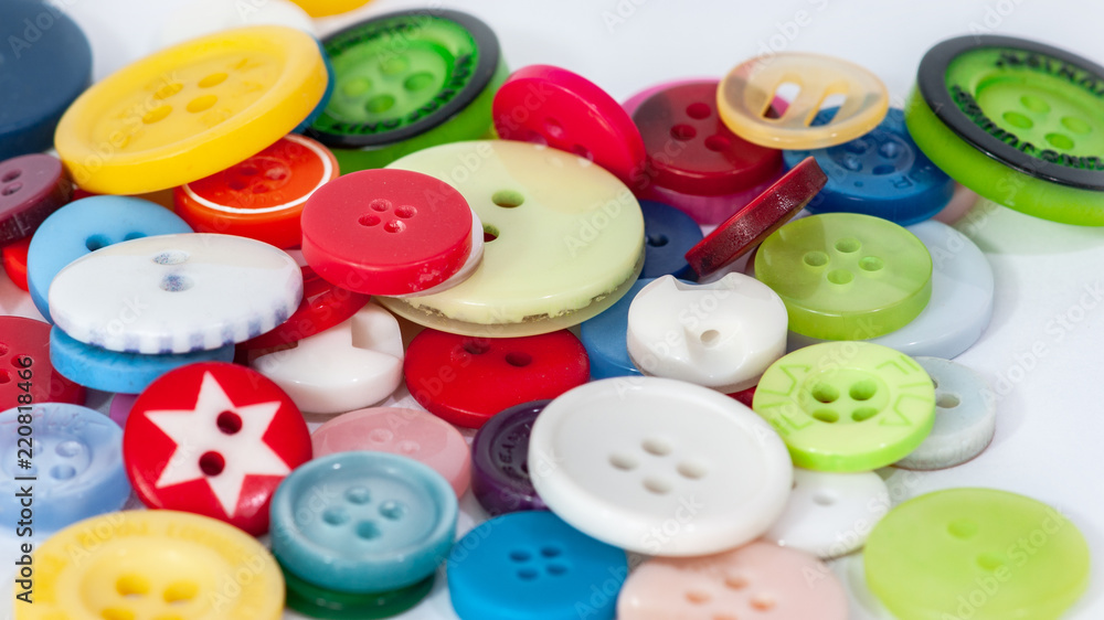 Buttons of different colours and sizes on a white background Buttons of different colours and sizes on a white background