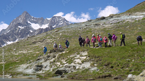 Asian Tour Group Hiking in Mountains of Switzerland - Commercially Usable