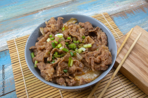 Cooked beef with rice on bowl