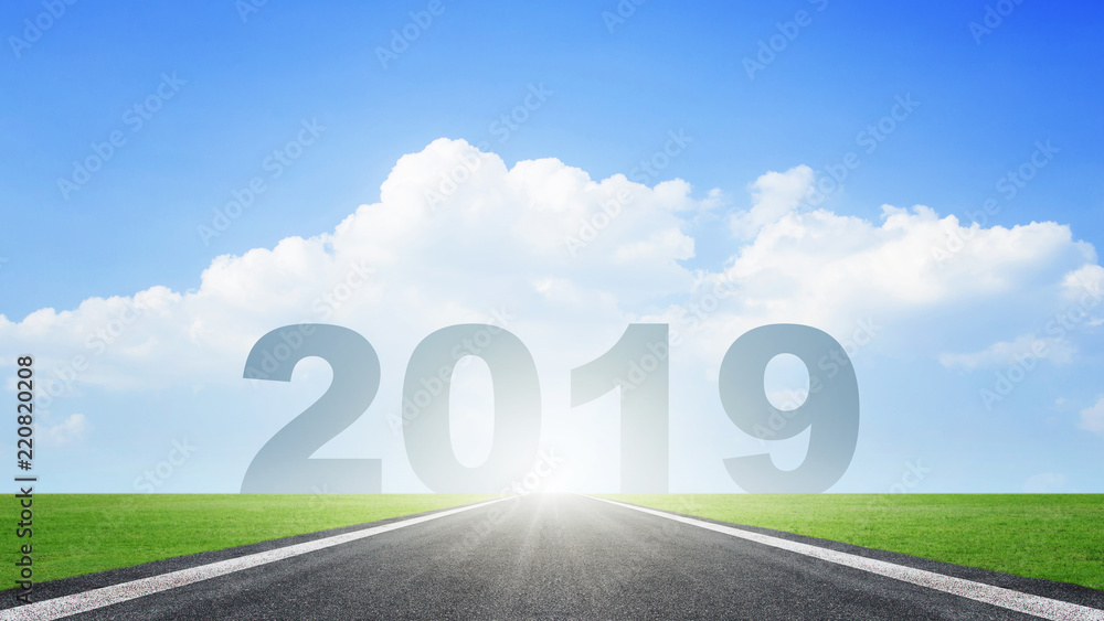 Asphalt road with 2019 letters in front for the new year. Concept for success in the future goal and passing time Asphalt road with 2019 letters in front for the new year. Concept for success in the future goal and passing time