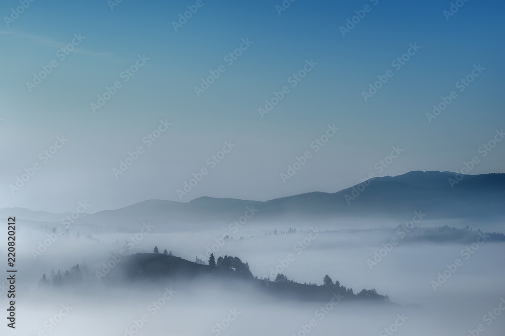 foggy morning in mountains. amazing fairy landscape