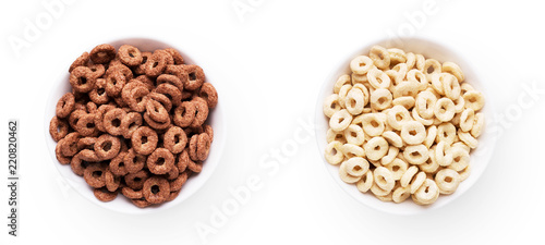Bowl with chocolate corn rings isolated on white
