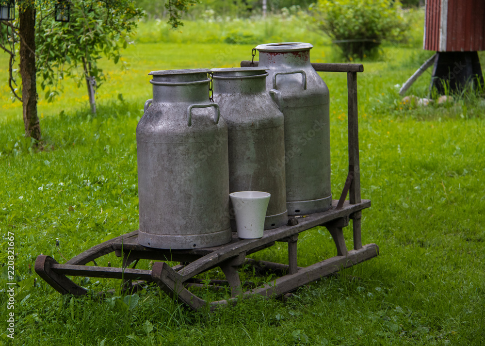 Old Milk Cans on a Sled in Finland