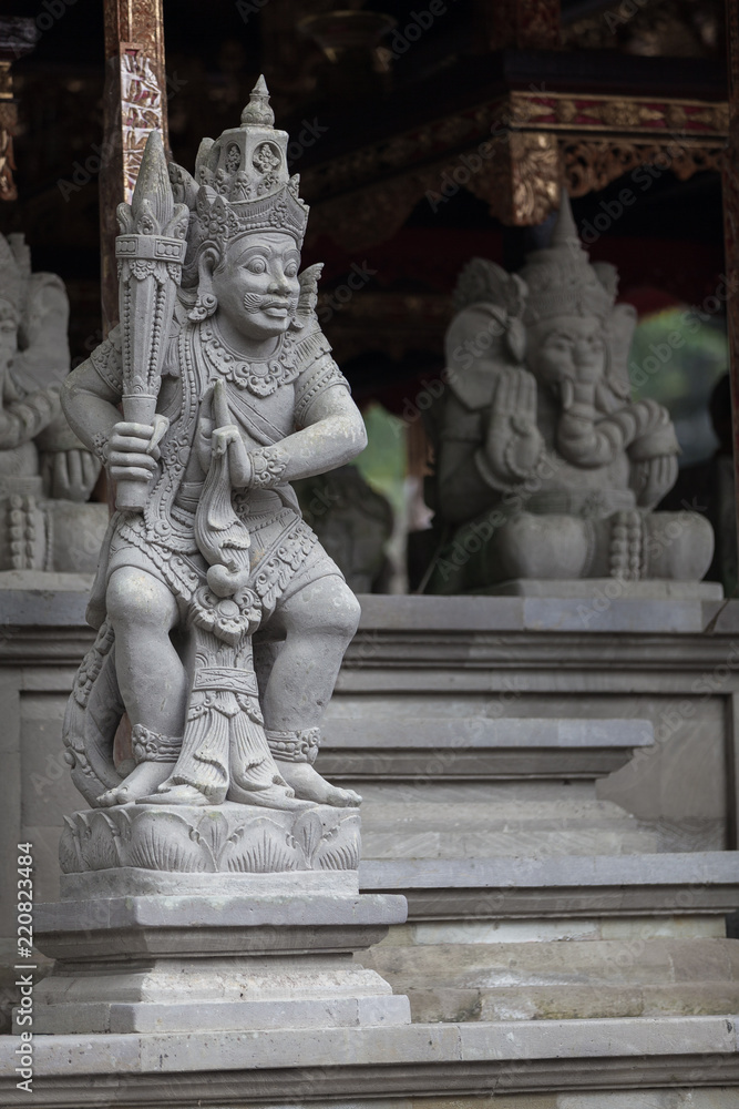 Old Carved Statue in a Balinese Temple