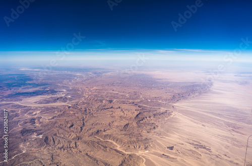 Egypt view from the airplane desert mountains.