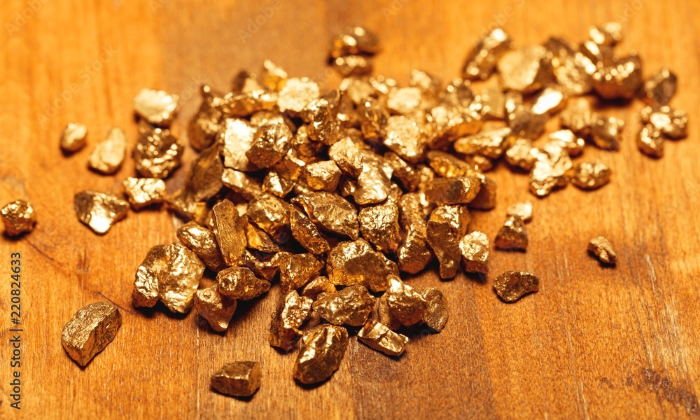 Gold nuggets on background. closeup Gold nuggets on background. closeup