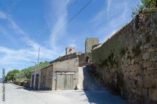 Calle de Pinhel y el castillo al fonfo, Portugal. photo