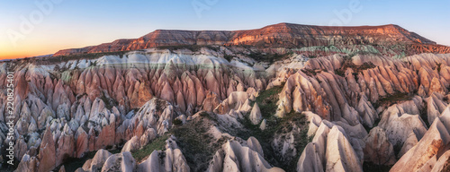 beautiful panoramic view of  Red Valley, Cappadocia, Turkey on sunset. natiral background