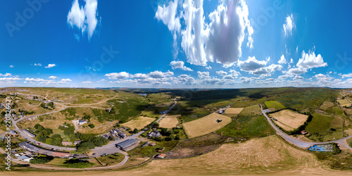 Aerial 360 degree panorama of the small Welsh village of Trefil during a hot, summer drought photo