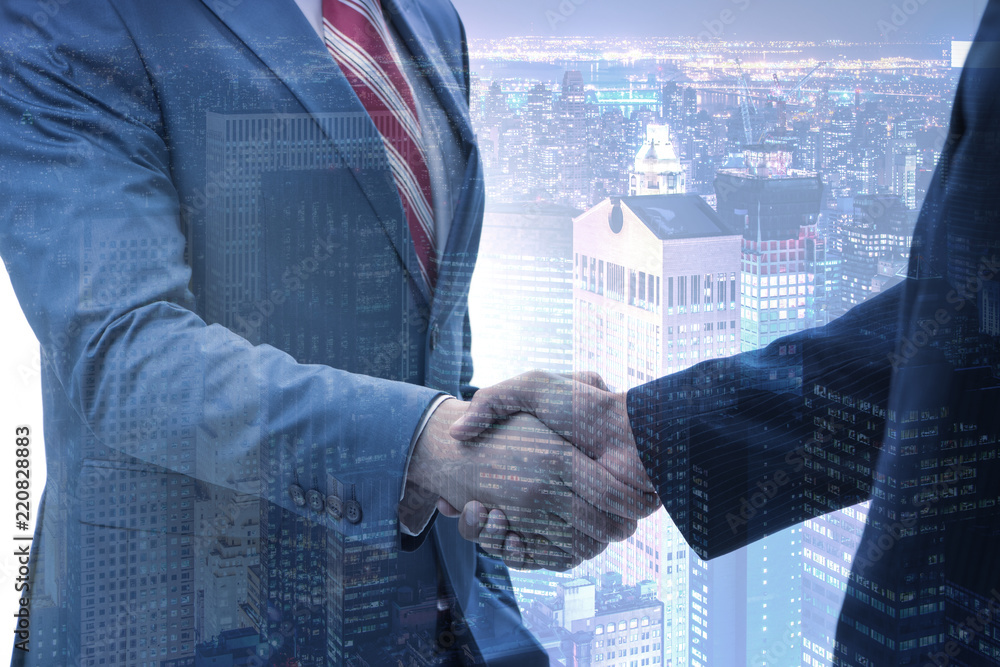 Business concept of cooperation with handshake Business concept of cooperation with handshake