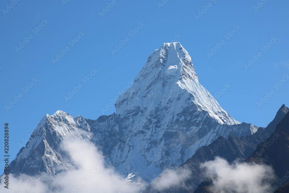 Wonderful view of mountain Ama Dablam in the Mount Everest range, iconic peak of Everest trekking route, eastern Nepal Wonderful view of mountain Ama Dablam in the Mount Everest range, iconic peak of Everest trekking route, eastern Nepal