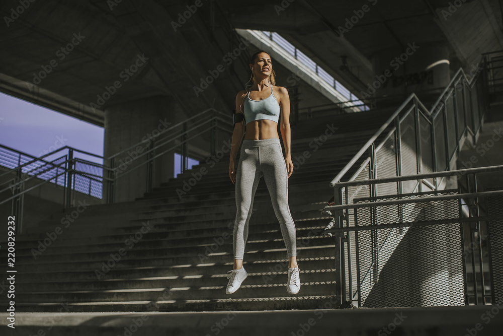 Young woman exercise in urban enviroment by day Young woman exercise in urban enviroment by day