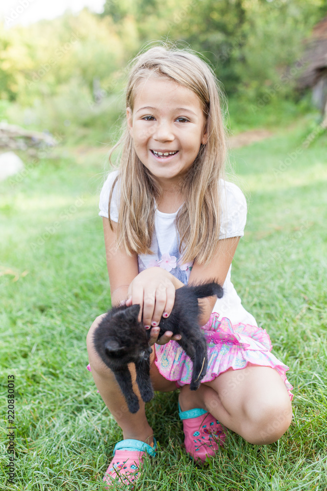 Happy Little Girl With Kitten Happy Little Girl With Kitten