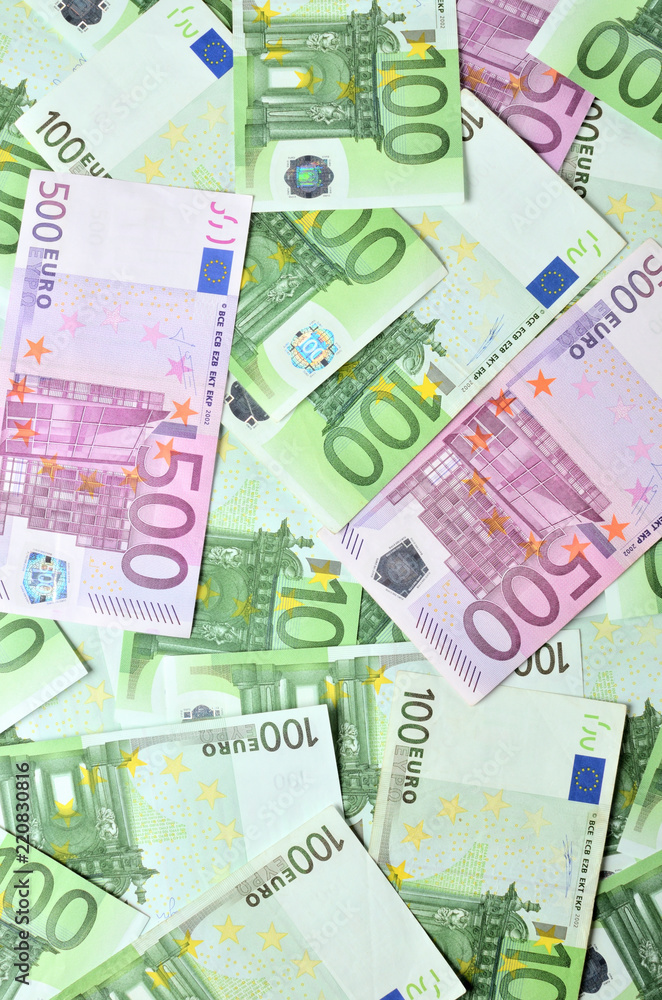 View from above of euro banknotes texture - hundreds euro money background View from above of euro banknotes texture - hundreds euro money background