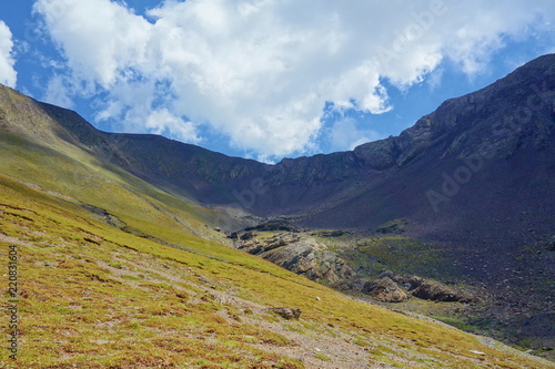 Grand alpine mountain range during summer on a hiking trail leading from Juta to Chaukhi pass, Caucasus mountains, Georgia © Tom