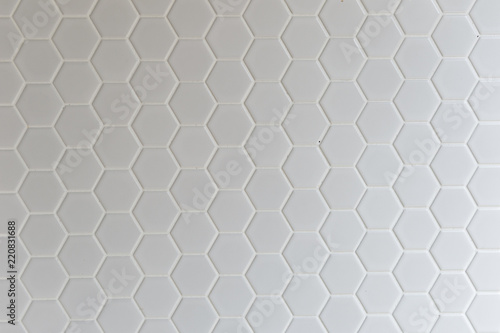 A simple white texture pattern of hexagons as a background