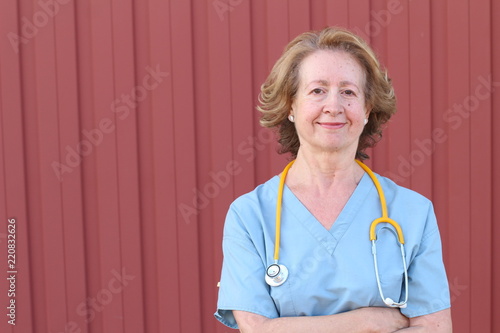 Obraz na płótnie Older nurse close up with copy space