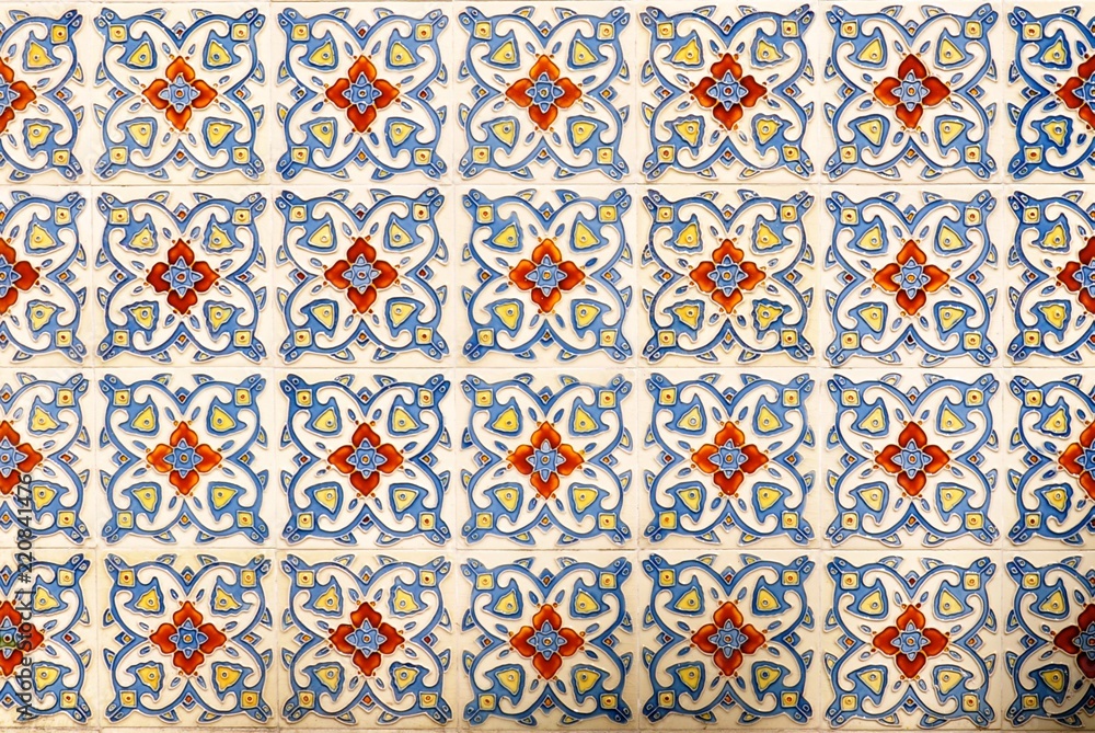 Mosaic of colourful ornate floral ceramic tiles typical of designs found on the frontage of traditional Chinese peranakan shop houses Mosaic of colourful ornate floral ceramic tiles typical of designs found on the frontage of traditional Chinese peranakan shop houses