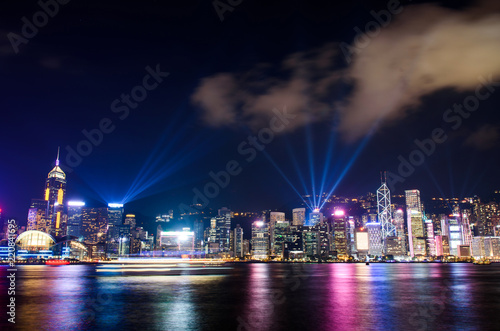 Laser show over Hong Kong cityscape at downtown modern building area