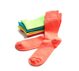 Different colorful socks on white background