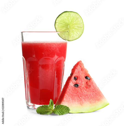 Tasty summer watermelon drink in glass and slice of fresh fruit on white background