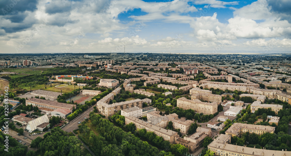 Aerial drone panoramic view of historical city center of Magnitogorsk, architectural ensemble of 50s, rest and sport place on the foreground