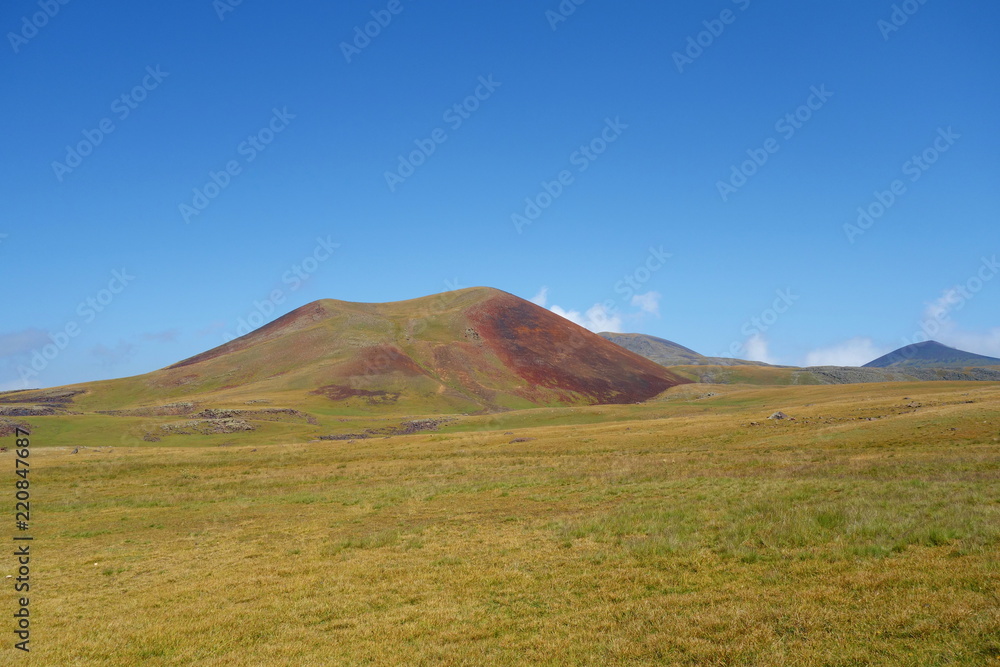 Landscape of a hiking trail leading from Geghard to Sevaberd via Azhdahak volcano in Geghama mountains, Armenia Landscape of a hiking trail leading from Geghard to Sevaberd via Azhdahak volcano in Geghama mountains, Armenia