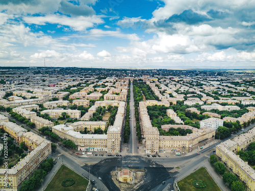 Aerial drone panoramic view of historical city center of Magnitogorsk, single style of buildings architectural ensembles of 50s with little gardens inside, Magnitogors, Russia