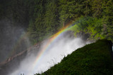 Landscape of Krimmel waterfalls with rainbow in Austria Alpen