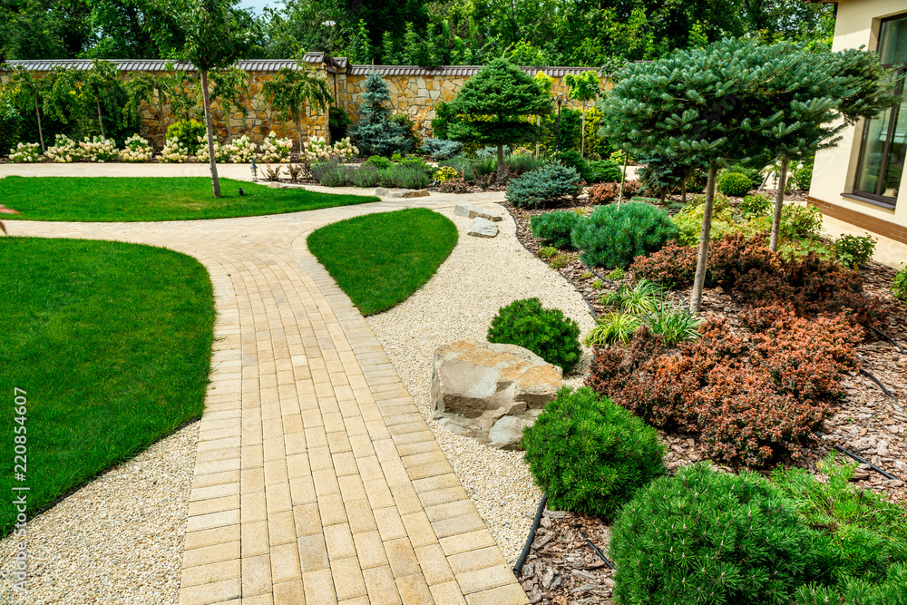 A country house with a beautiful backyard behind the house, landscape design A country house with a beautiful backyard behind the house, landscape design