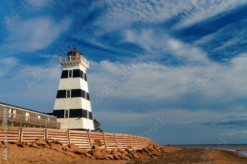 West Point Lighthouse along the shore of rural Prince Edward Island, Canada.