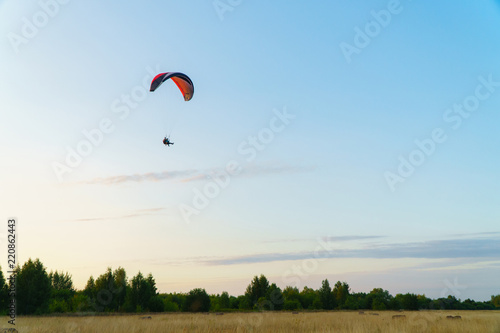 Paraplane on the blue sky background, leisure activity. © SergeyCash