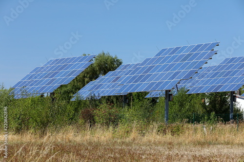 Energiepark aus Windkraft und Solaranlagen photo