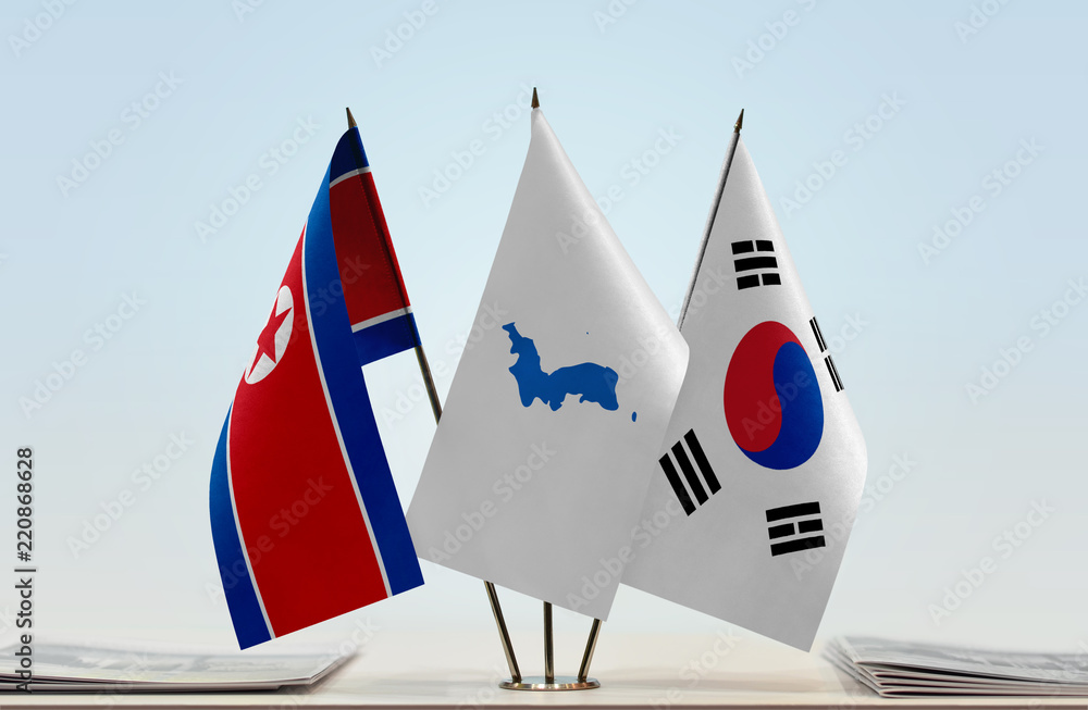 Flags of North Korea and South Korea with a Korean Unification flag in ...