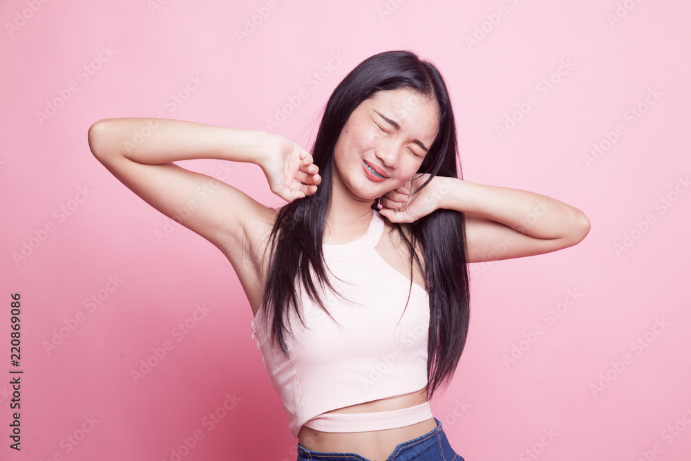Sleepy young Asian woman yawn. Sleepy young Asian woman yawn.